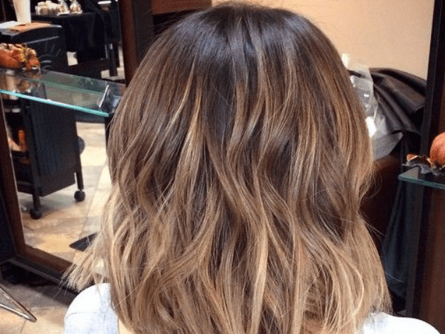 balayage hair colouring on dark hair from the back